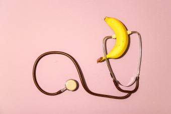 a medical device attached to a banana - very funky looking