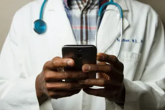 Doctor holding a phone