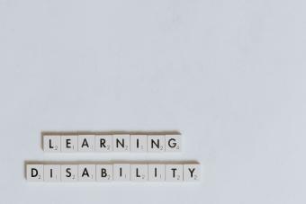 Scrabble tiles spelling out "Learning Disability"