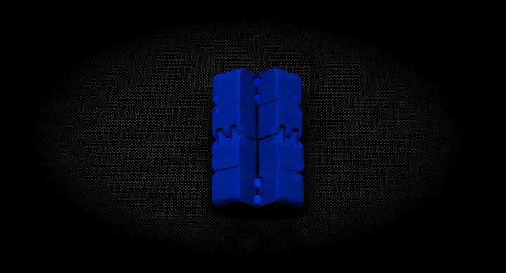Blue fidget cube folded out, hinges visible